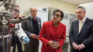 Penny Pritzker, U.S. Sen. Tom Carper, UD President Dennis Assanis.