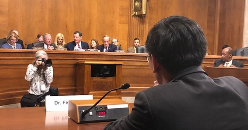 Feng Jiao speaking in front of Senate Committee